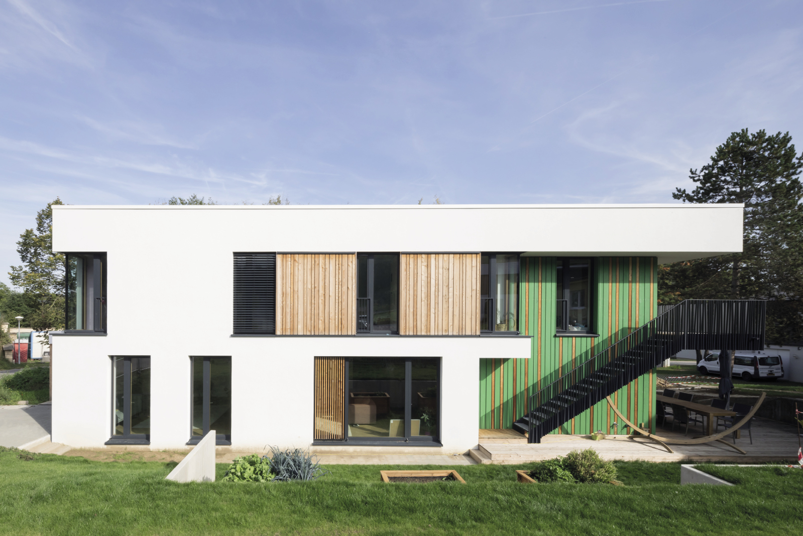 2 Deux foyers passifs au SOS Kannerduerf Mersch, construction hybride bois / massif. Protection solaire & refroidissement nocturne. planetplus ARCHITECTES ET URBANISTES